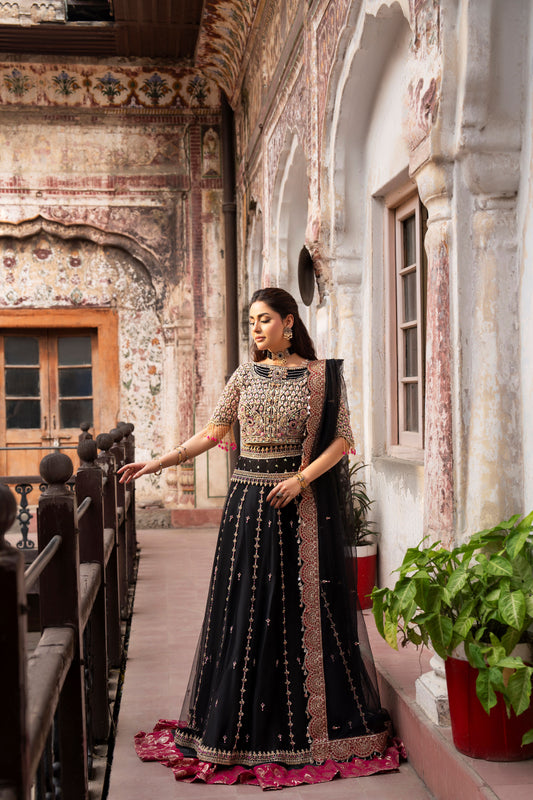Woman in traditional outfit standing in an ornate architectural setting